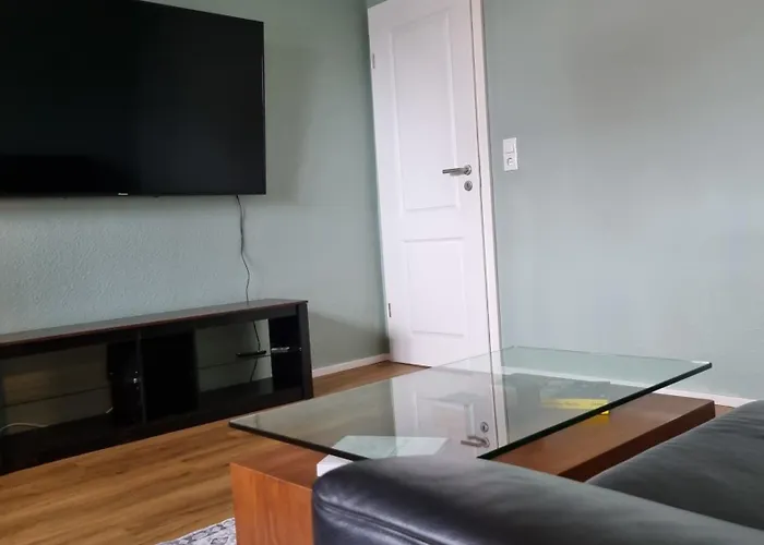 Design Apartment, Klimaanlage, Parkplatz, Netflix & Disney, Dominos Pizza, Wallbox *