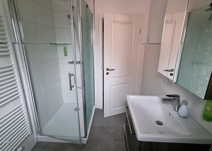 Appartement Design Apartment, Klimaanlage, Parkplatz, Netflix & Disney, Dominos Pizza, Wallbox